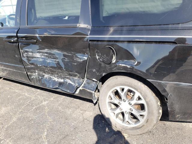 Photo 9 from auction – 2014 KIA SEDONA LX with VIN KNDMG4C71E6543214