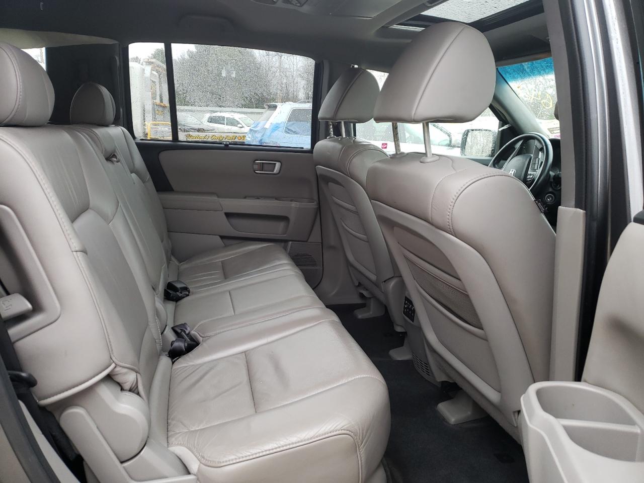 Foto 6 de la subasta – 2011 HONDA PILOT TOUR con VIN 5FNYF4H91BB057162
