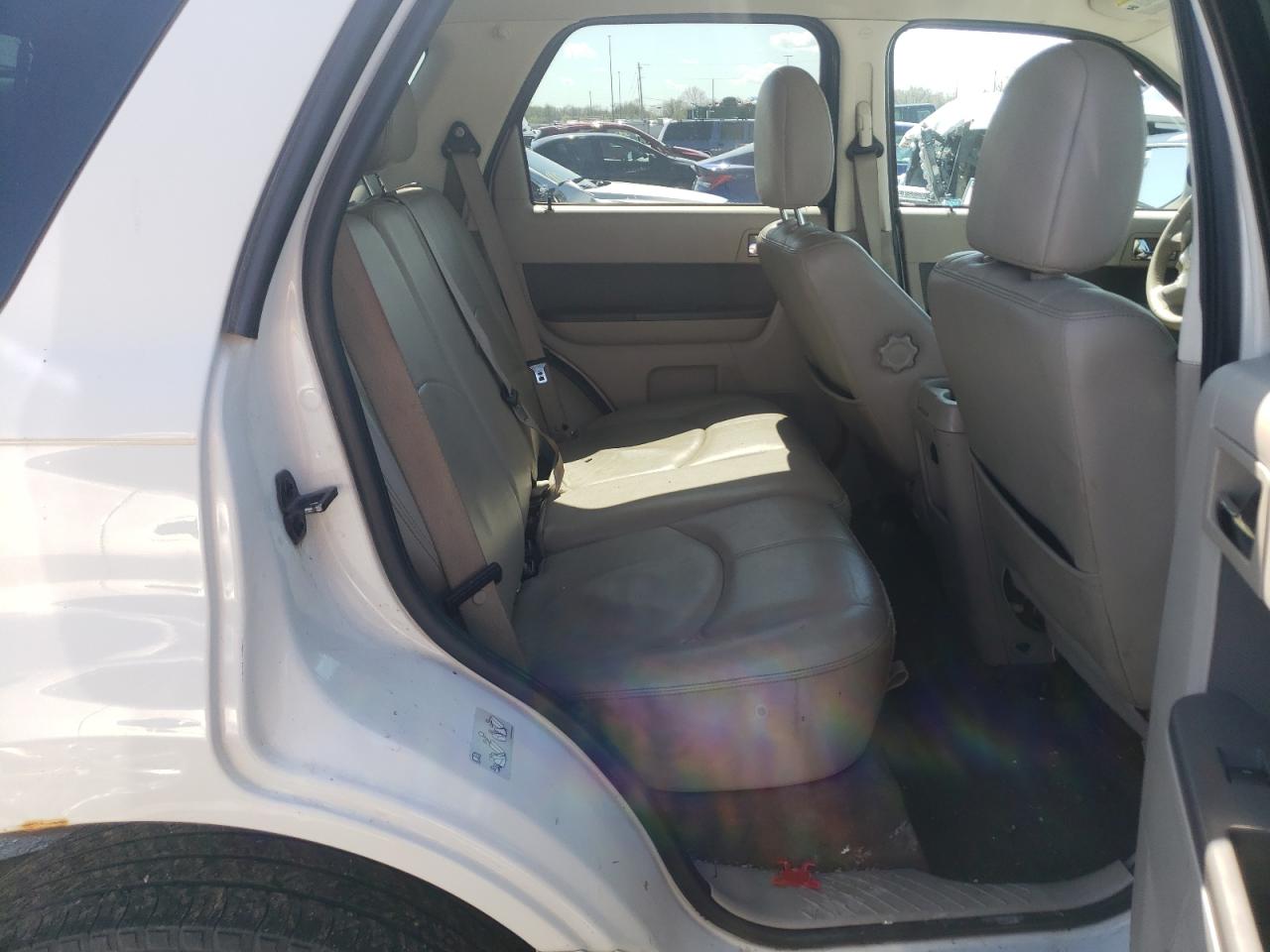 Photo 6 from auction – 2011 MERCURY MARINER PR with VIN 4M2CN9HG8BKJ08050