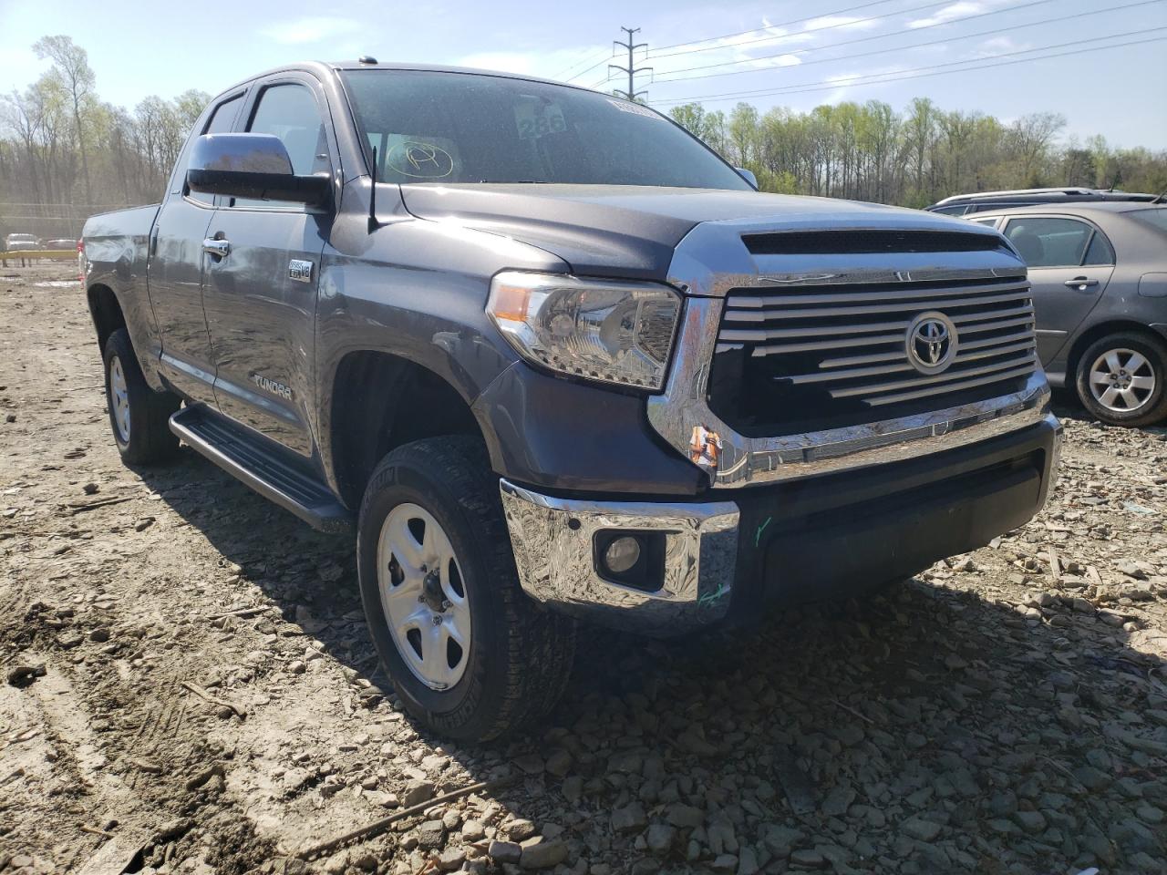 TOYOTA TUNDRA DOU 2014 with VIN 5TFBY5F13EX409266 - Photo from auction