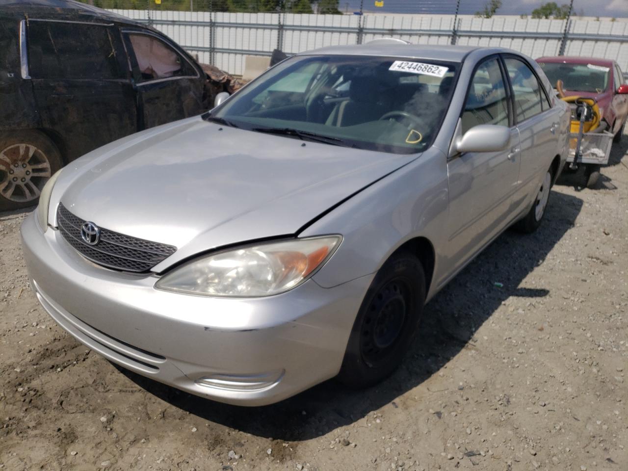 Photo 12 from auction – 2002 TOYOTA CAMRY LE with VIN 4T1BE32K42U592889