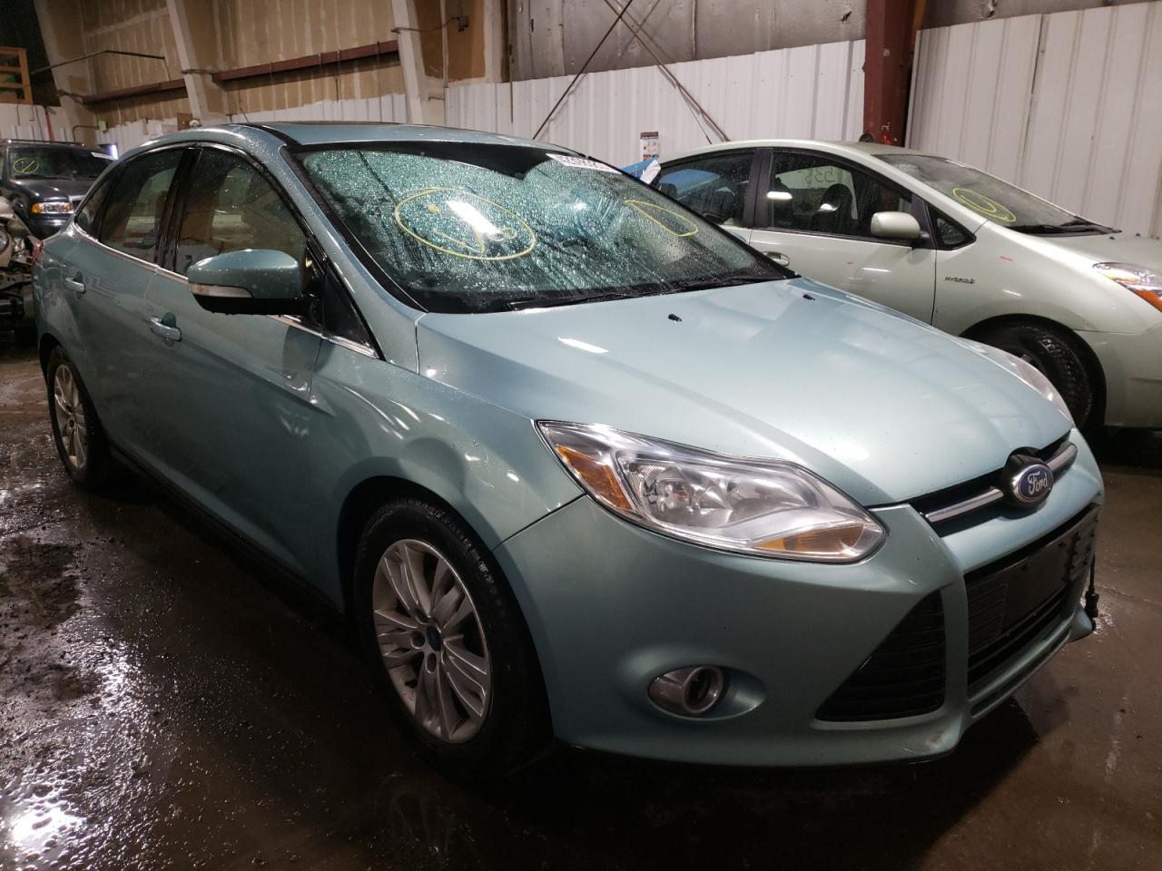 FORD FOCUS SEL 2012 with VIN 1FAHP3H27CL237793 - Photo from auction