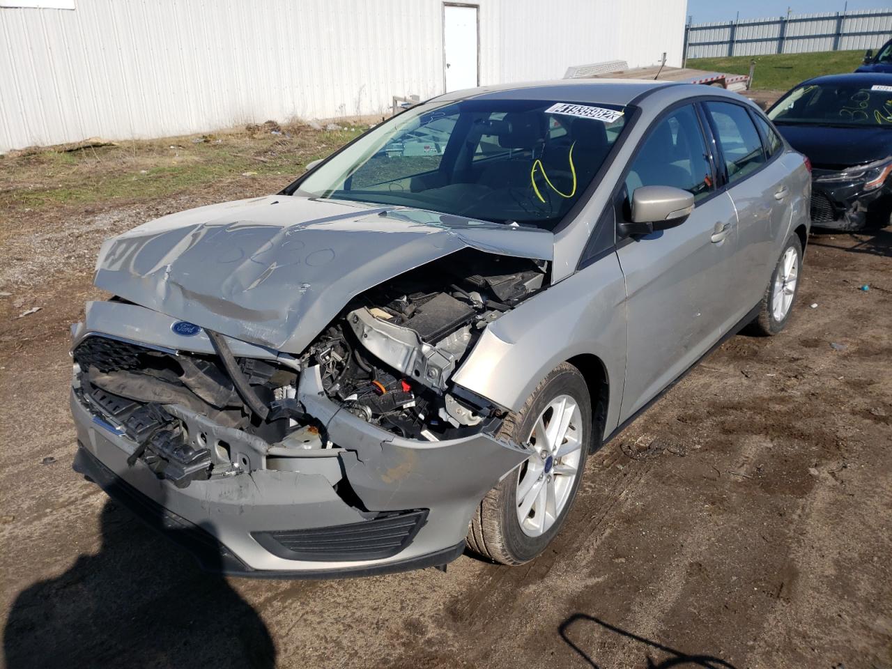 Photo 2 from auction – 2016 FORD FOCUS SE with VIN 1FADP3F28GL248230