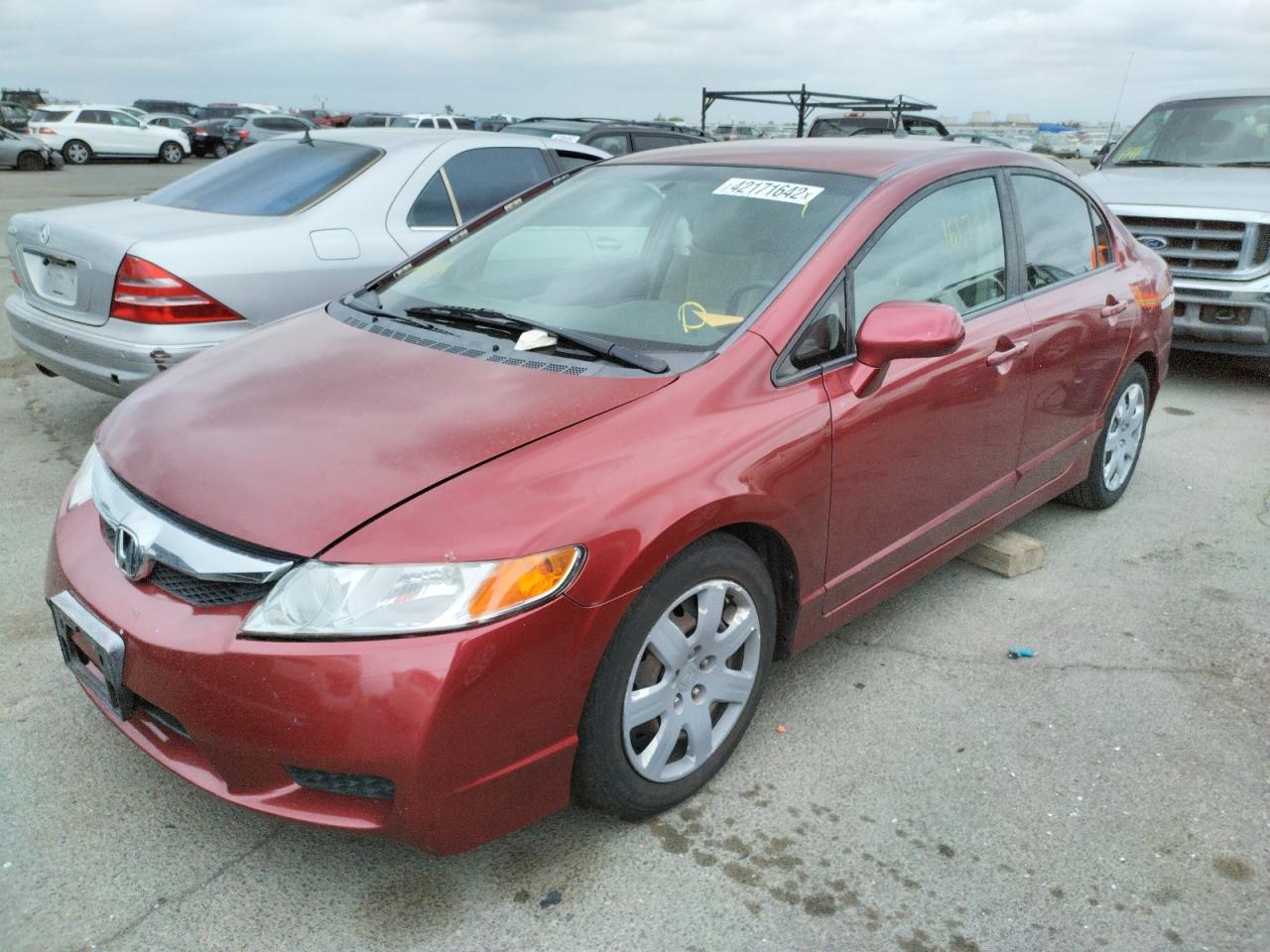 Photo 2 from auction – 2011 HONDA CIVIC LX with VIN 2HGFA1F58BH549770