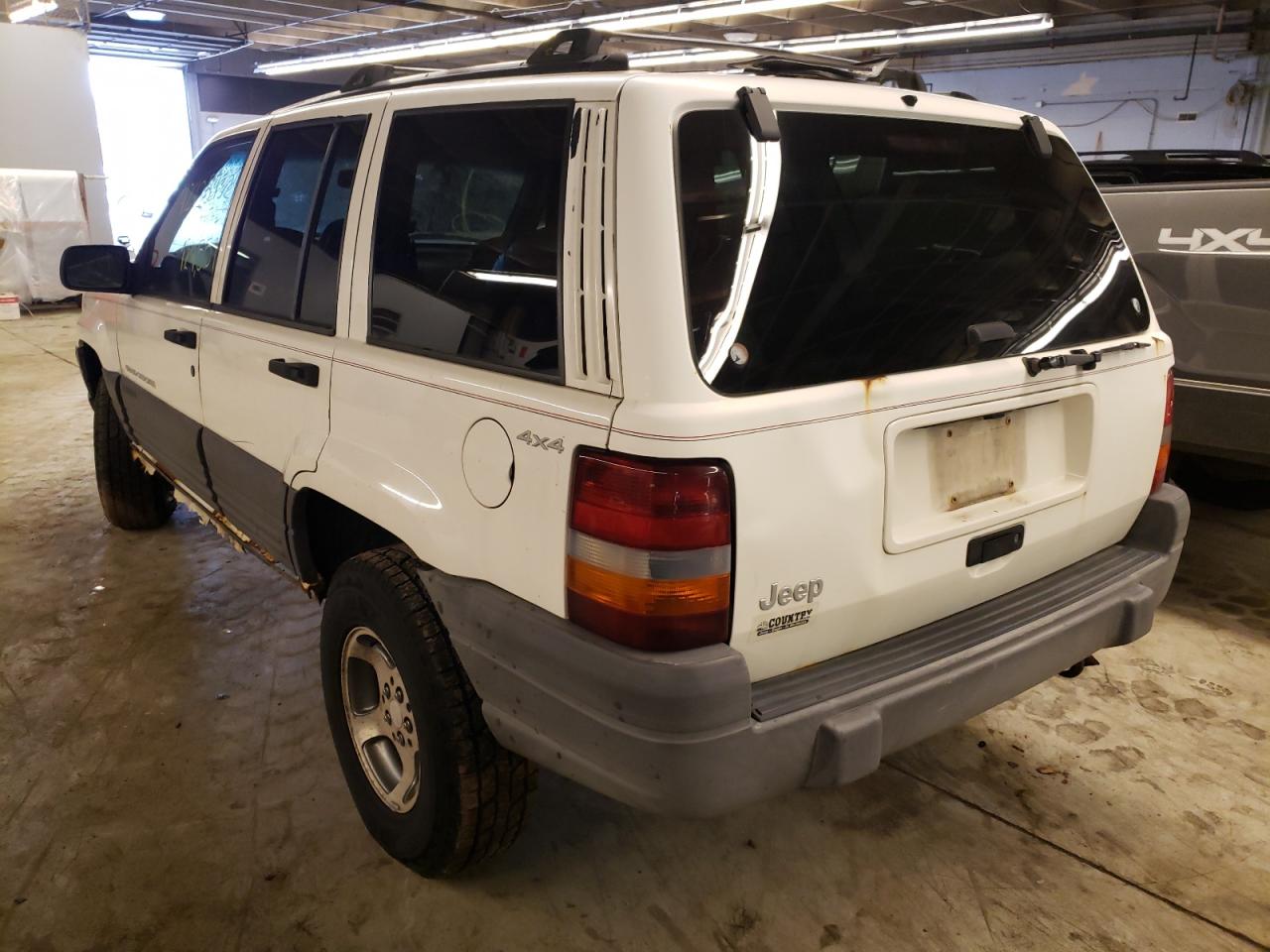 Photo 3 from auction – 1997 JEEP GRAND CHER with VIN 1J4GZ58S3VC607016