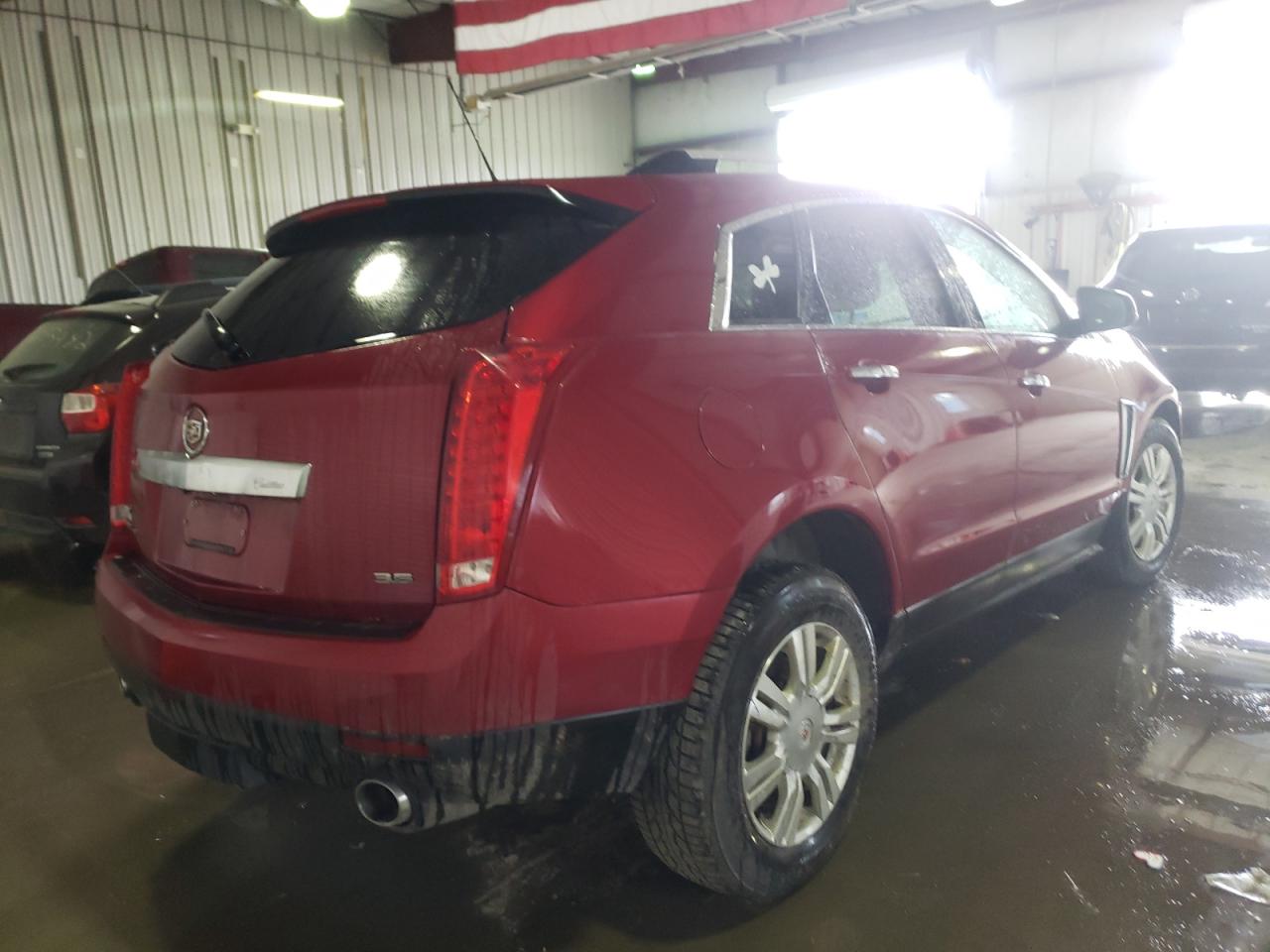 Photo 4 from auction – 2015 CADILLAC SRX LUXURY with VIN 3GYFNEE33FS520412