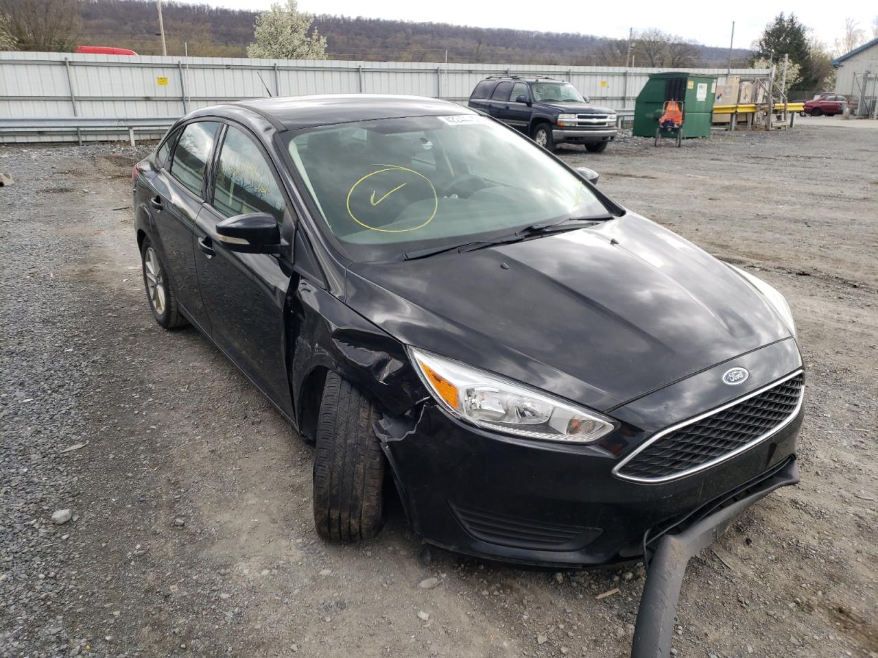 FORD FOCUS SE 2017 with VIN 1FADP3F24HL234214 - Photo from auction