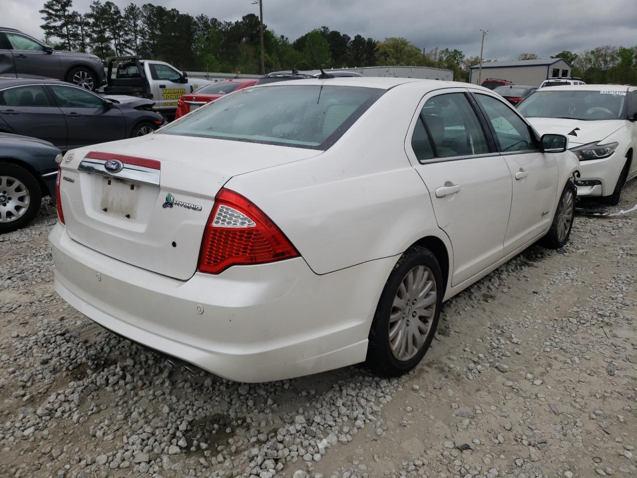 Photo 4 from auction – 2011 FORD FUSION HYB with VIN 3FADP0L38BR119331
