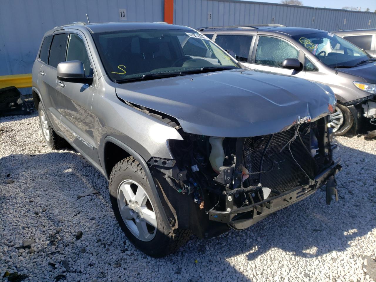 JEEP GRAND CHER 2011 with VIN 1J4RR4GG3BC693701 - Photo from auction