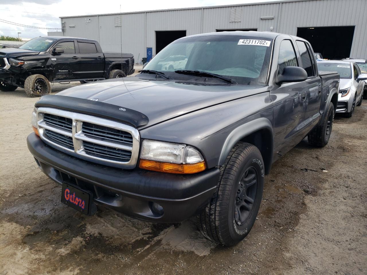 Photo 2 from auction – 2004 DODGE DAKOTA QUA with VIN 1D7HL38K34S742474