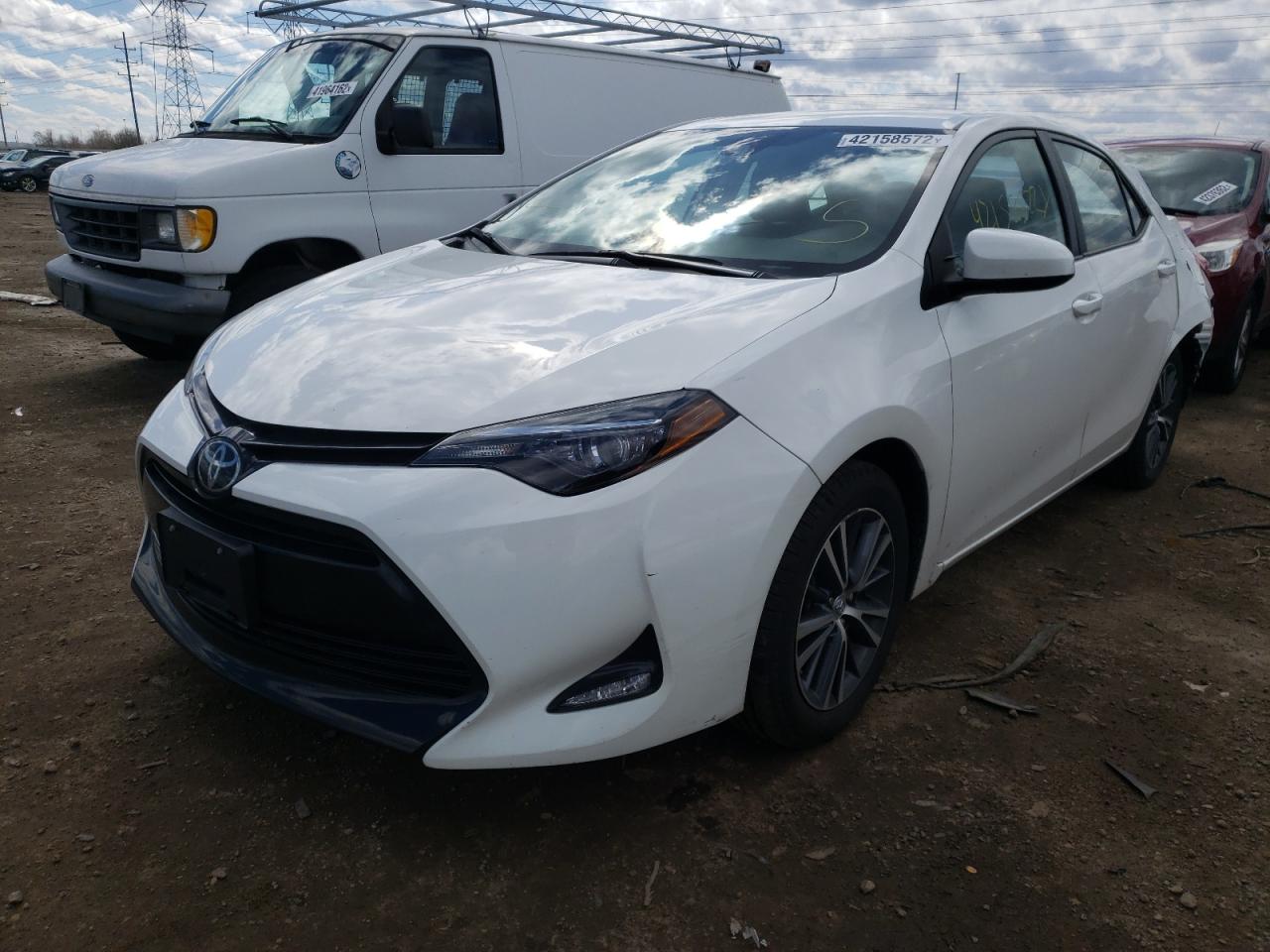 Photo 2 from auction – 2018 TOYOTA COROLLA L with VIN 5YFBURHEXJP742852