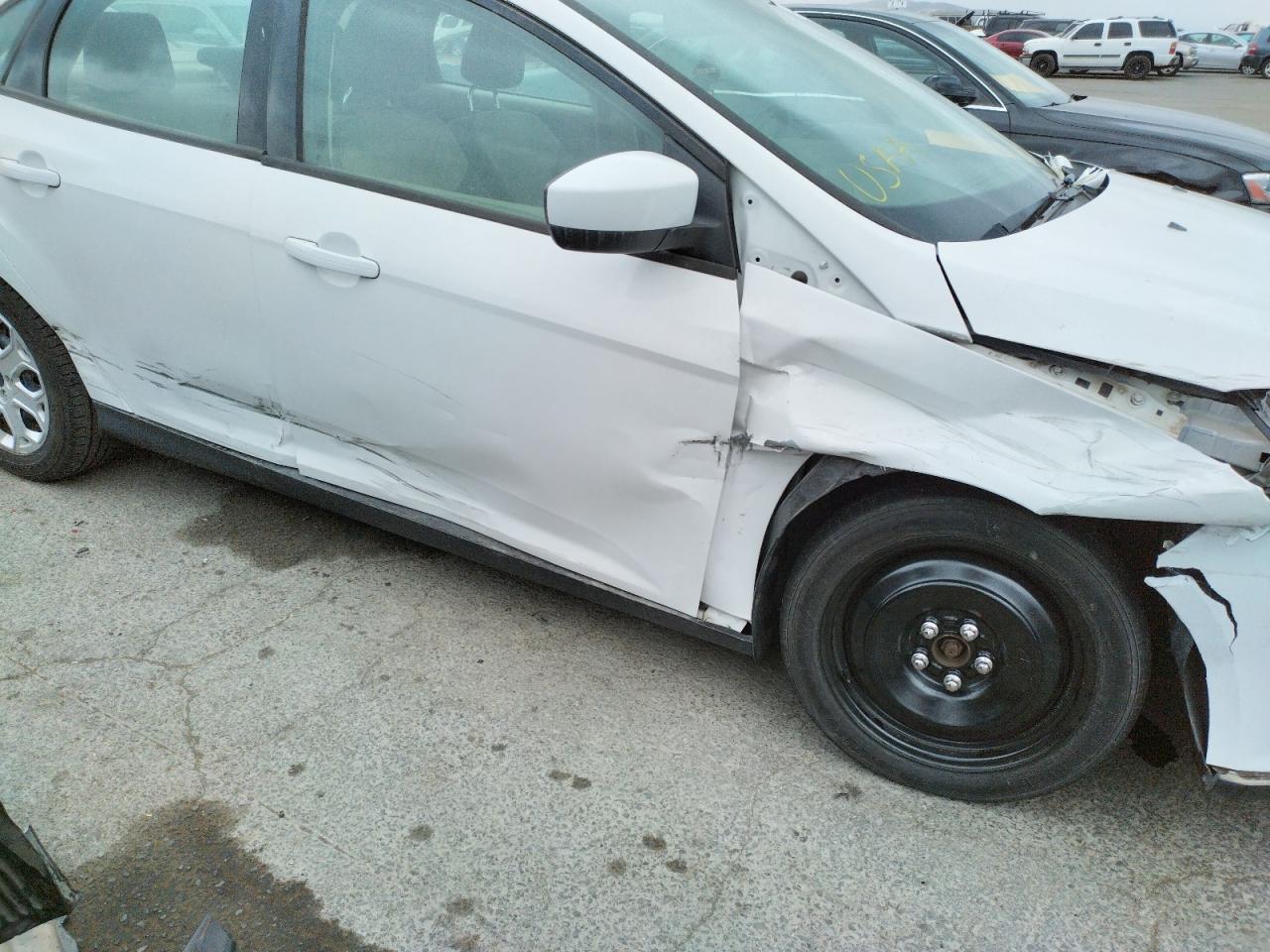Photo 9 from auction – 2012 FORD FOCUS SE with VIN 1FAHP3F27CL314536