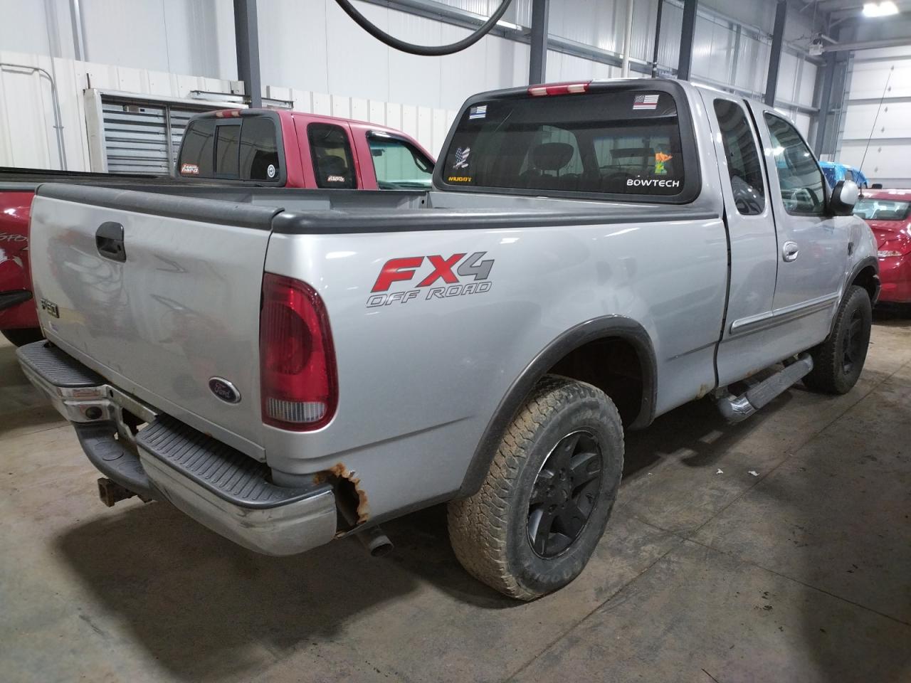 Photo 4 from auction – 2002 FORD F150 with VIN 1FTRX18L42NA93280