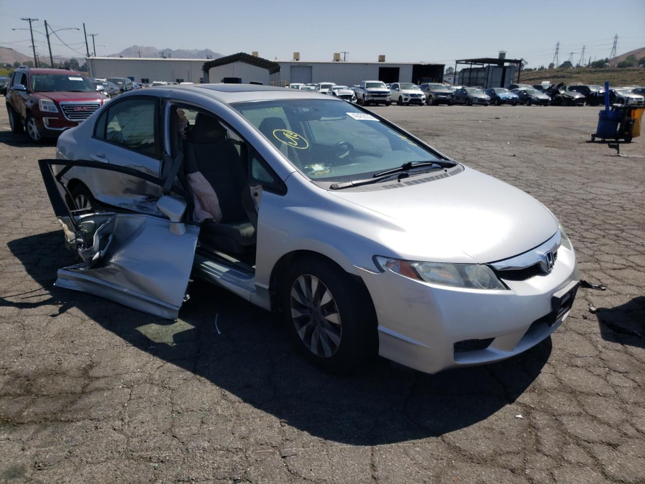 HONDA CIVIC EX 2009 with VIN 2HGFA16859H330026 - Photo from auction