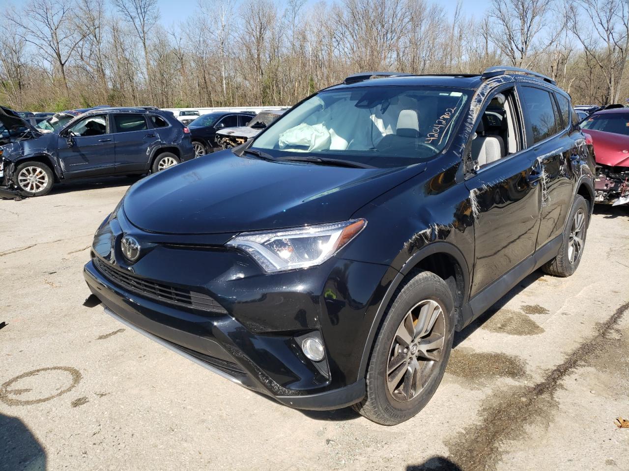 Photo 2 from auction – 2018 TOYOTA RAV4 ADVEN with VIN 2T3RFREV5JW696348