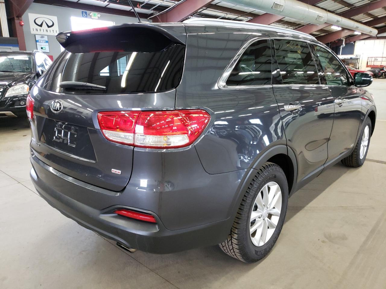 Photo 4 from auction – 2016 KIA SORENTO LX with VIN 5XYPGDA36GG169308