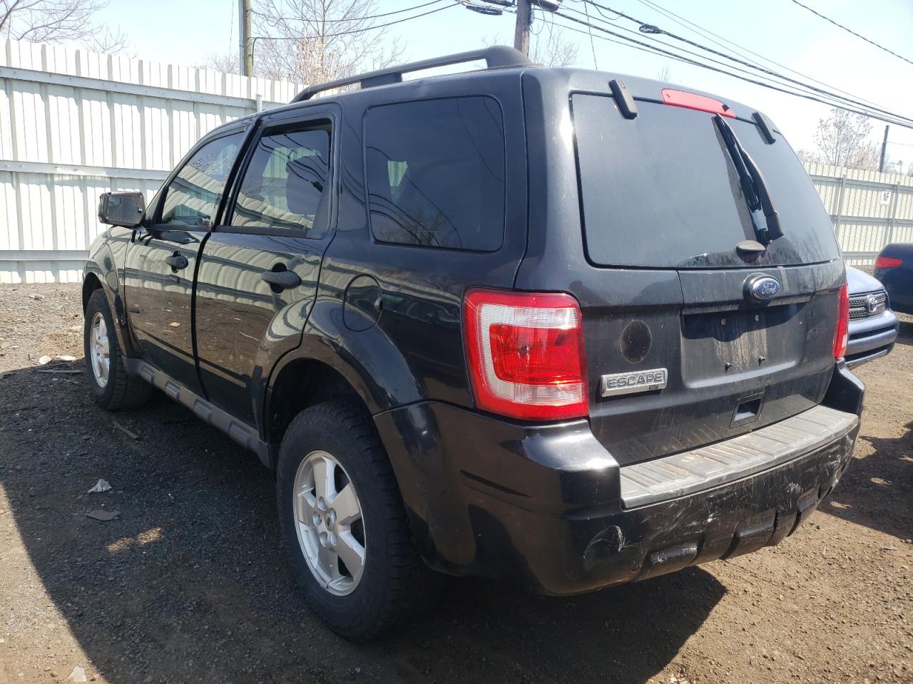 Photo 3 from auction – 2011 FORD ESCAPE XLT with VIN 1FMCU9D74BKC24274