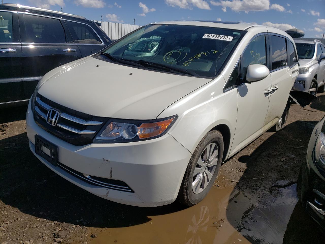 Photo 2 from auction – 2016 HONDA ODYSSEY EX with VIN 5FNRL5H66GB079092