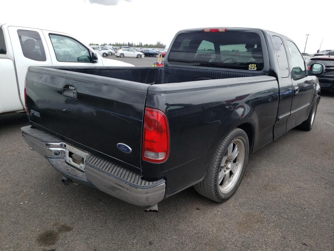 Photo 4 from auction – 2001 FORD F150 with VIN 1FTRX17LX1NB09305
