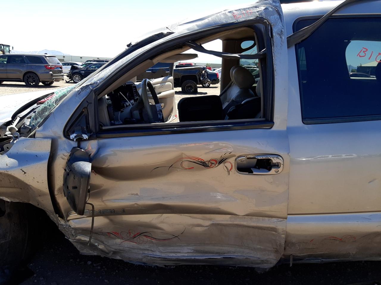 Photo 10 from auction – 2002 GMC DENALI with VIN 1GKEK63U82J262898