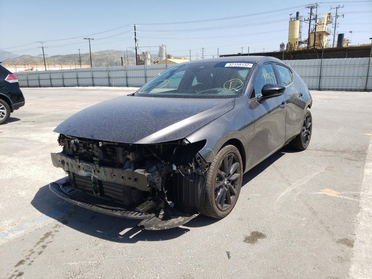 Photo 2 from auction – 2021 MAZDA 3 PREMIUM with VIN JM1BPBNY7M1401107