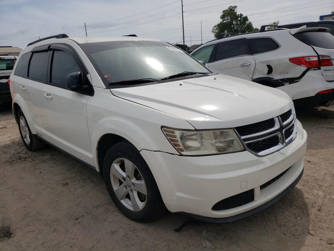 DODGE JOURNEY SE 2013 with VIN 3C4PDCABXDT618228 - Photo from auction
