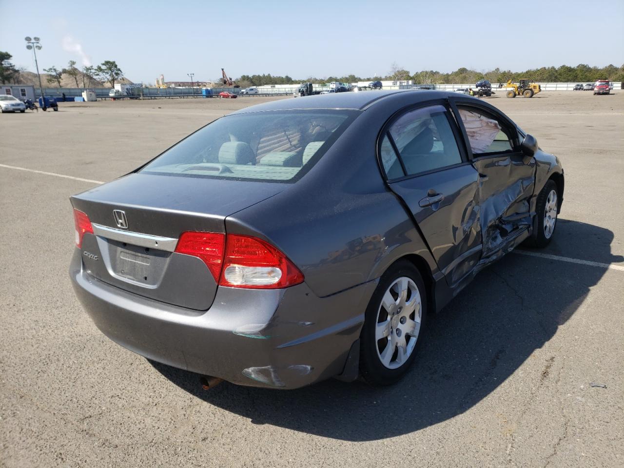 Photo 4 from auction – 2011 HONDA CIVIC LX with VIN 19XFA1F50BE042632