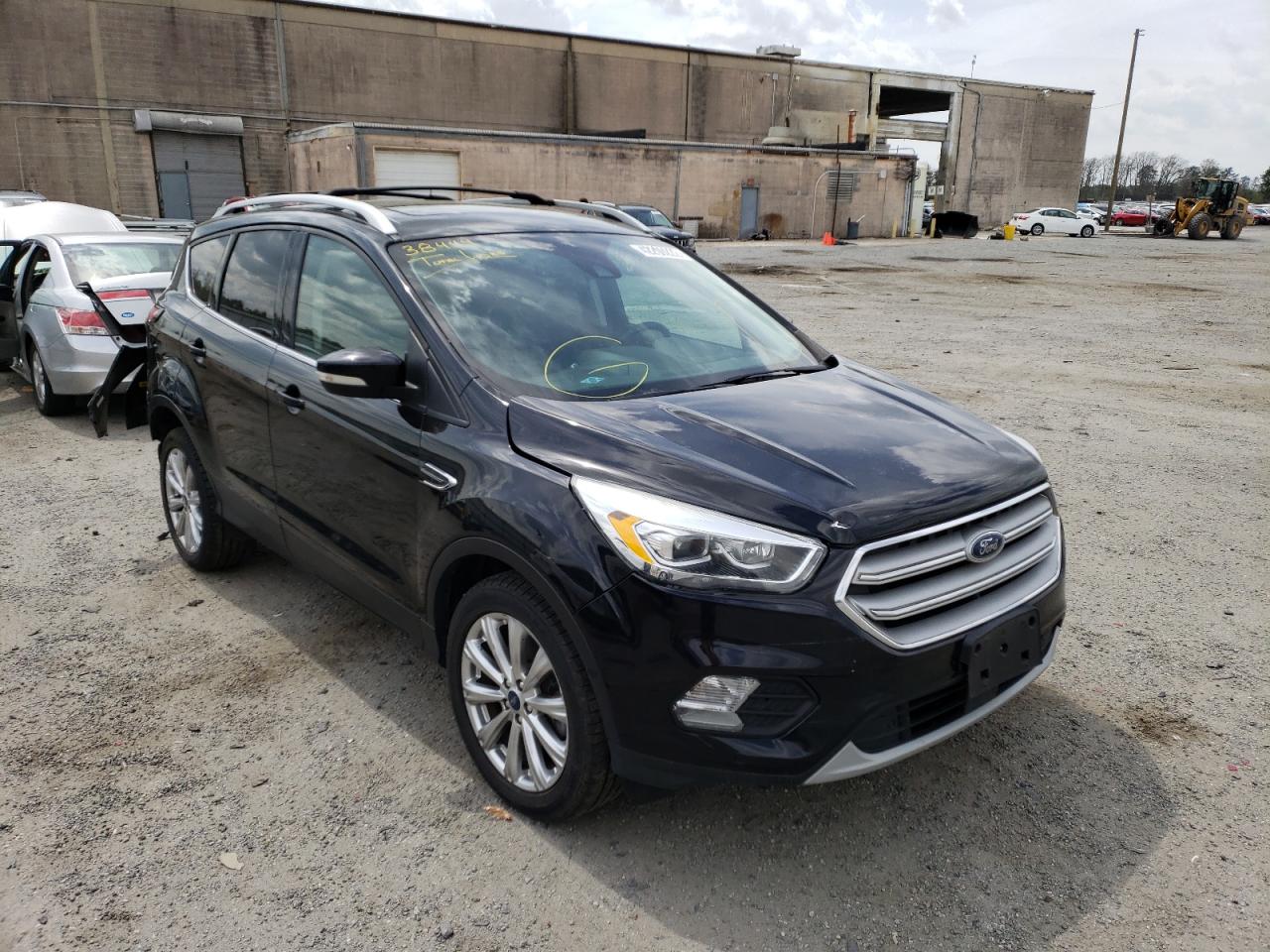FORD ESCAPE TIT 2018 with VIN 1FMCU9J96JUA14607 - Photo from auction