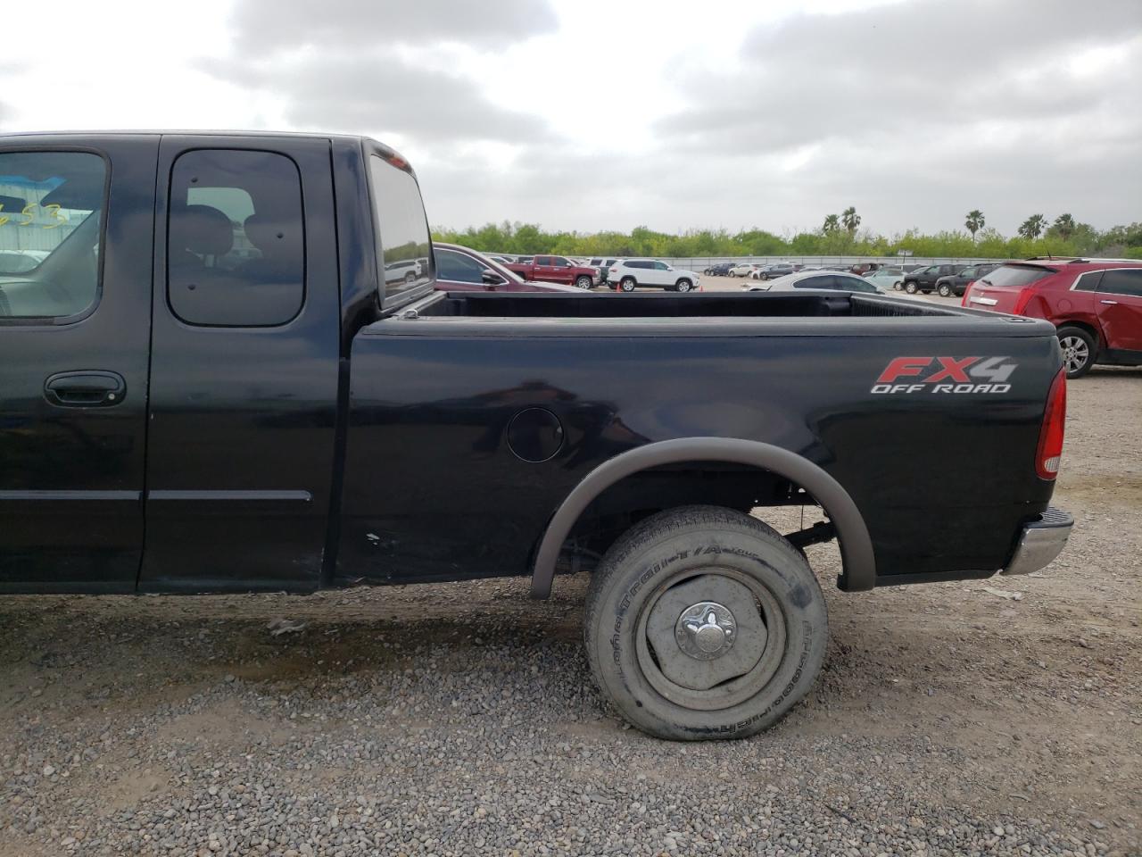 Photo 9 from auction – 2002 FORD F150 with VIN 1FTRX18W72KC80802