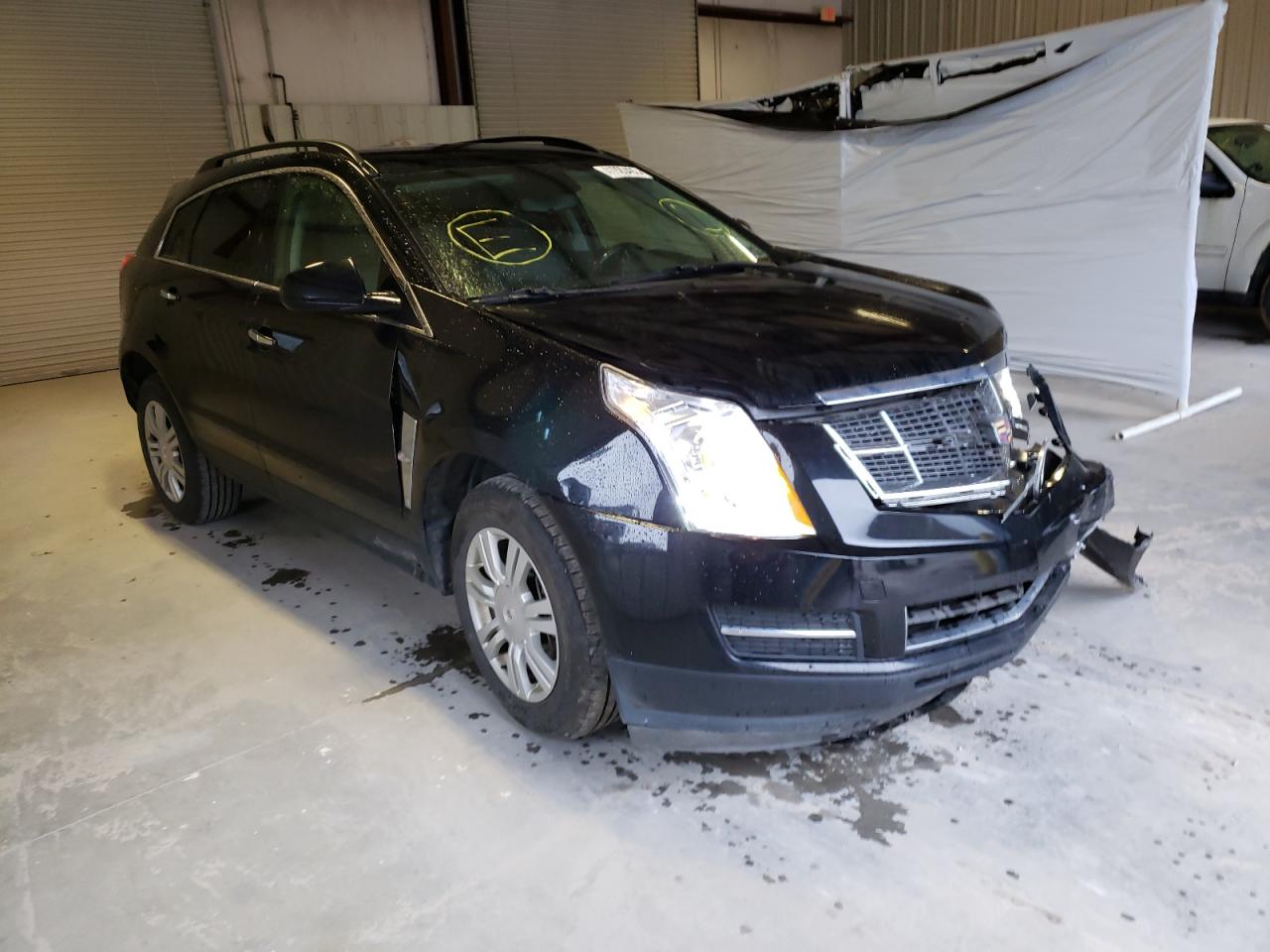 CADILLAC SRX 2011 with VIN 3GYFNGEY3BS673681 - Photo from auction