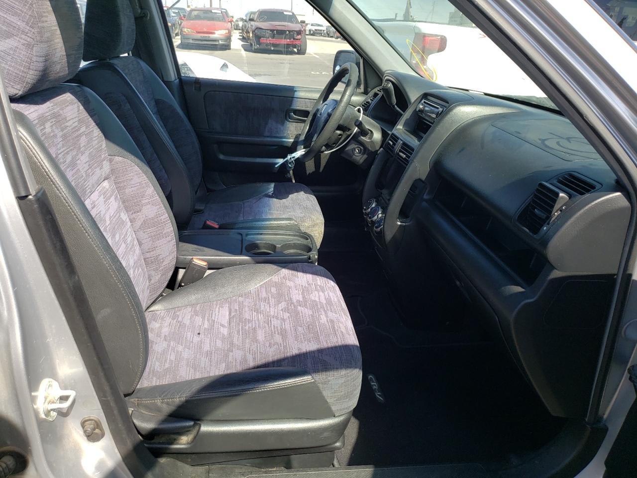 Photo 5 from auction – 2004 HONDA CR-V LX with VIN JHLRD68424C023566