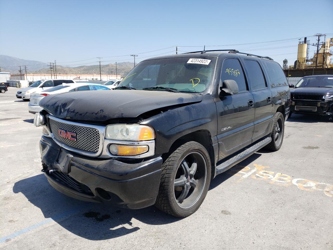 Photo 2 from auction – 2002 GMC DENALI XL with VIN 1GKFK66U92J326351