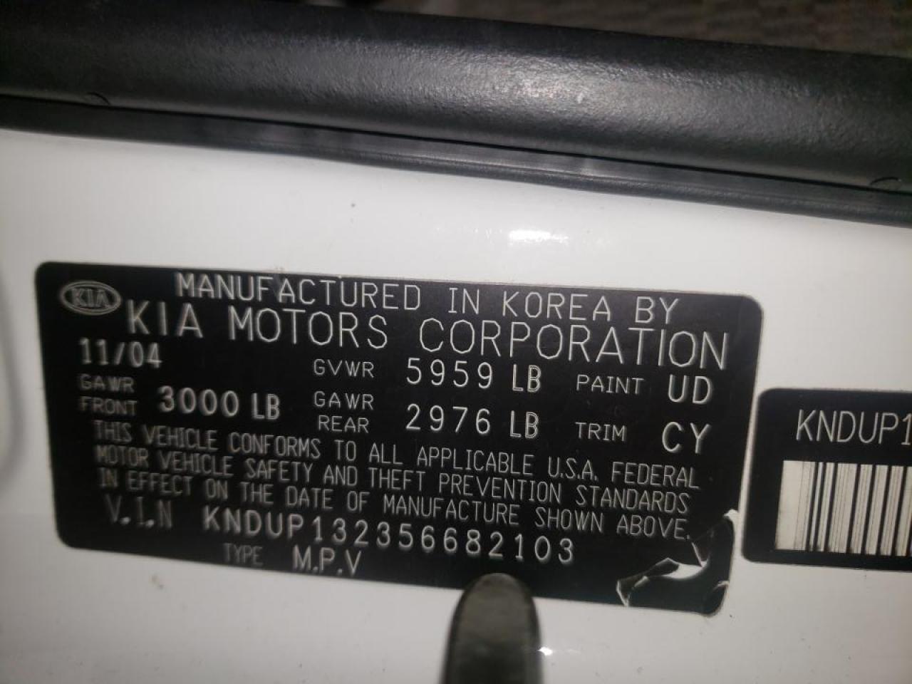 Photo 10 from auction – 2005 KIA SEDONA EX with VIN KNDUP132356682103