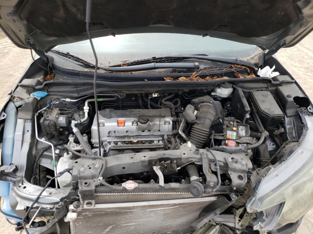 Photo 7 from auction – 2014 HONDA CR-V LX with VIN 2HKRM4H33EH614634