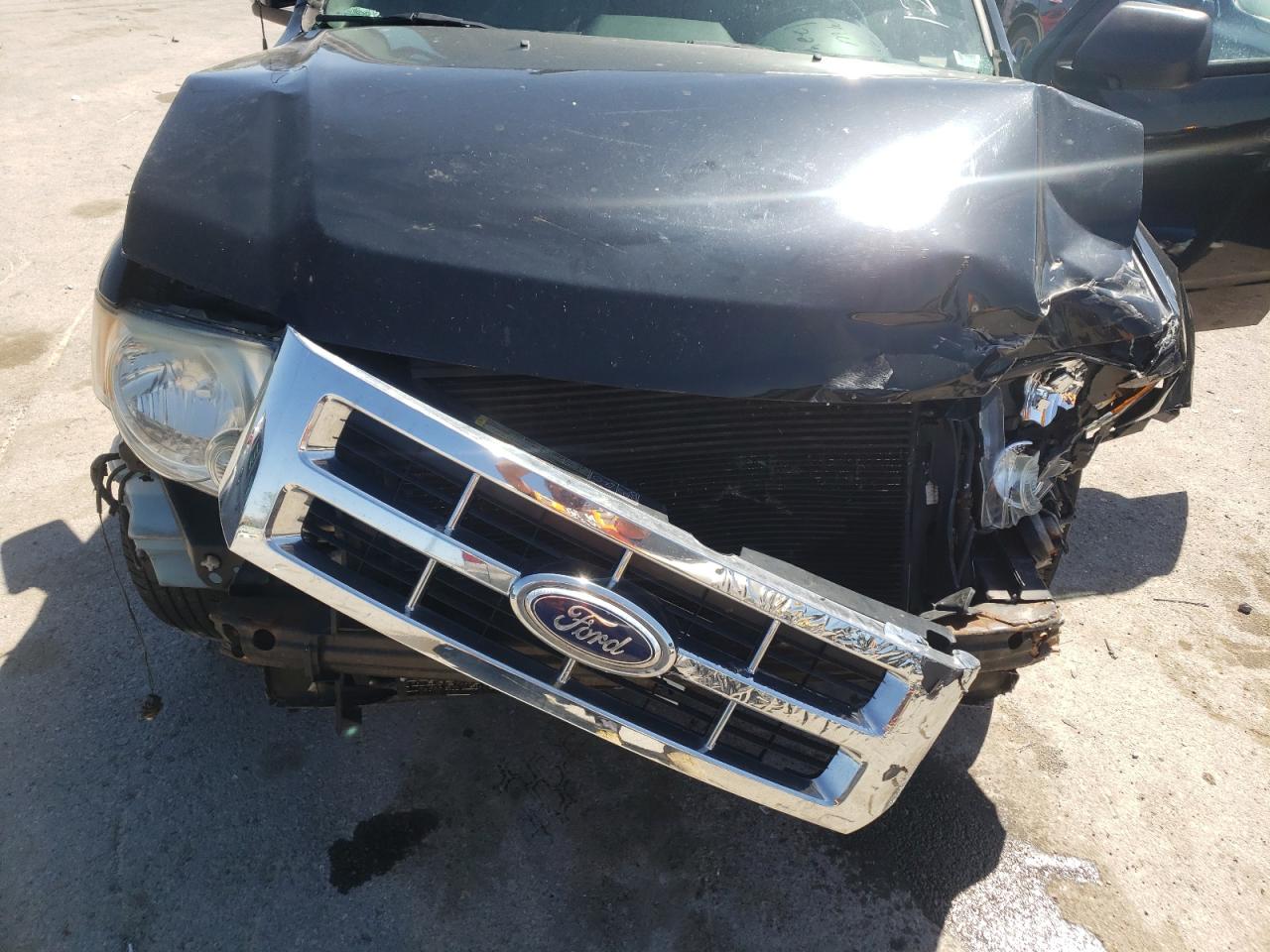 Photo 7 from auction – 2010 FORD ESCAPE LIM with VIN 1FMCU0EG9AKD11239