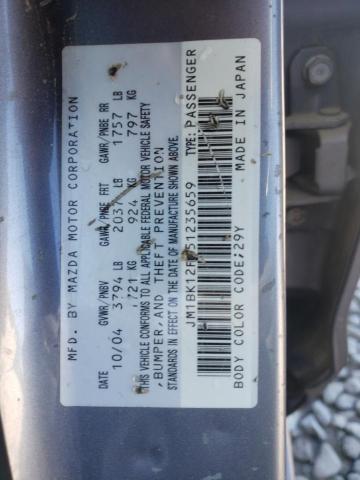 Photo 10 from auction – 2005 MAZDA MX-3 with VIN JM1BK12F851235659