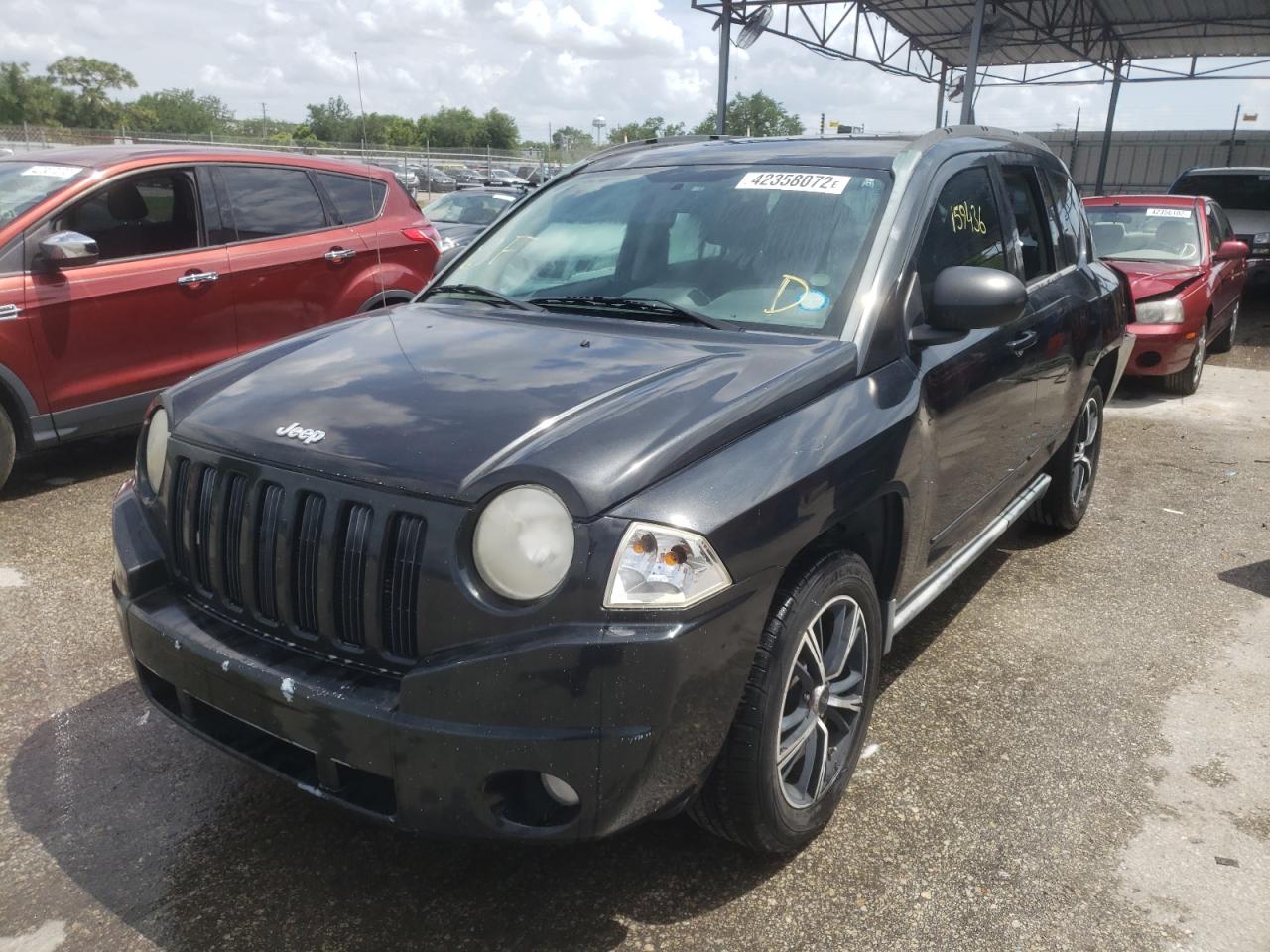 Photo 2 from auction – 2010 JEEP COMPASS SP with VIN 1J4NT4FB5AD601969