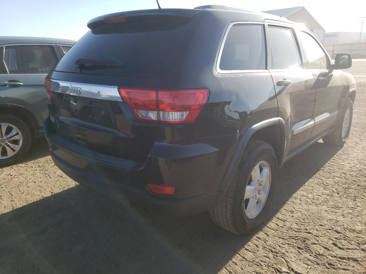 Photo 4 from auction – 2012 JEEP GRAND CHER with VIN 1C4RJFAG6CC124912