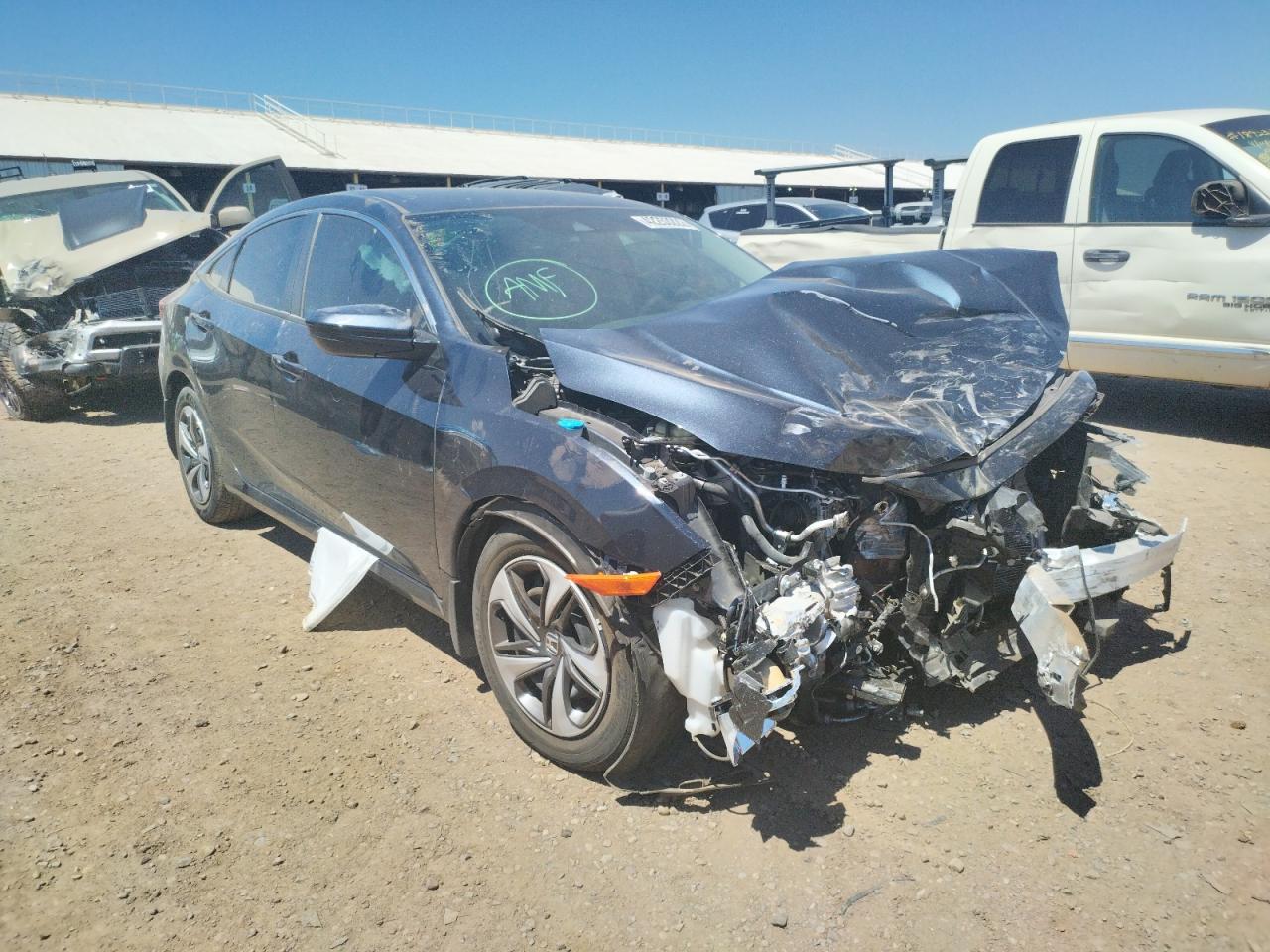 HONDA CIVIC LX 2020 with VIN 19XFC2F63LE015614 - Photo from auction