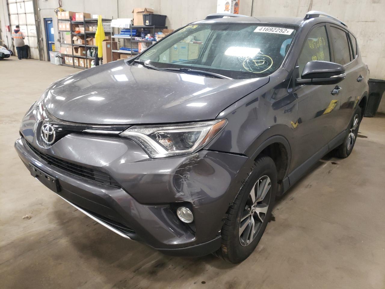 Photo 2 from auction – 2016 TOYOTA RAV4 XLE with VIN 2T3RFREV7GW425865