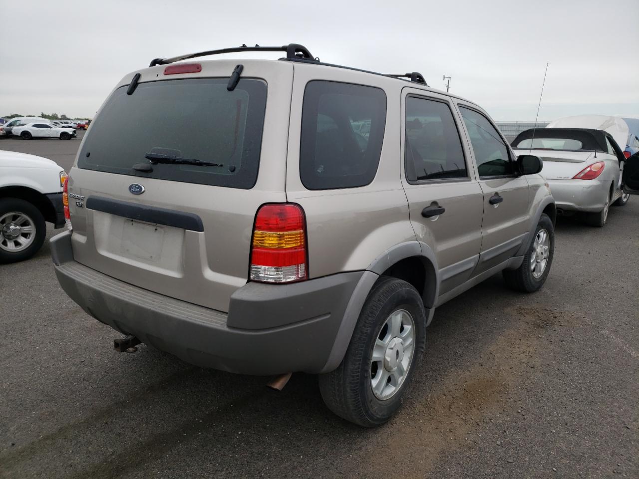 Photo 4 from auction – 2001 FORD ESCAPE XLT with VIN 1FMYU04141KA52579