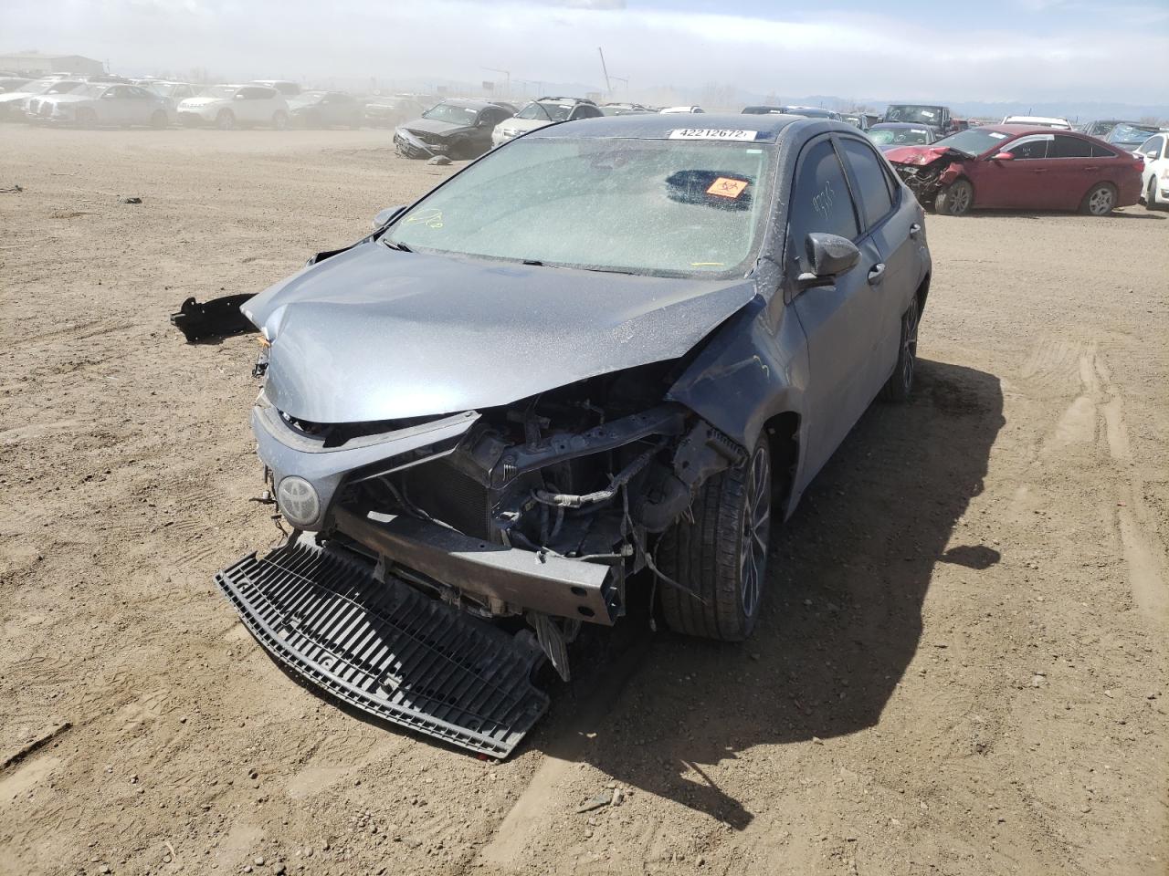 Photo 2 from auction – 2018 TOYOTA COROLLA L with VIN 2T1BURHE3JC015679
