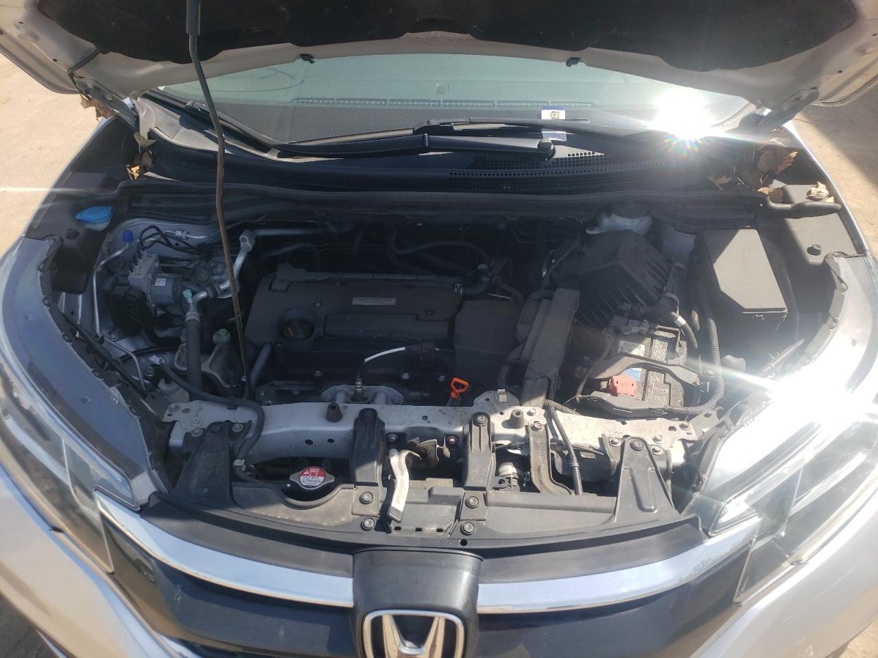 Photo 7 from auction – 2016 HONDA CR-V SE with VIN 2HKRM4H47GH708396