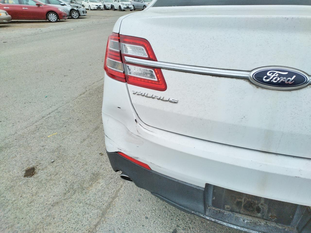 Photo 9 from auction – 2013 FORD TAURUS SE with VIN 1FAHP2D84DG169595