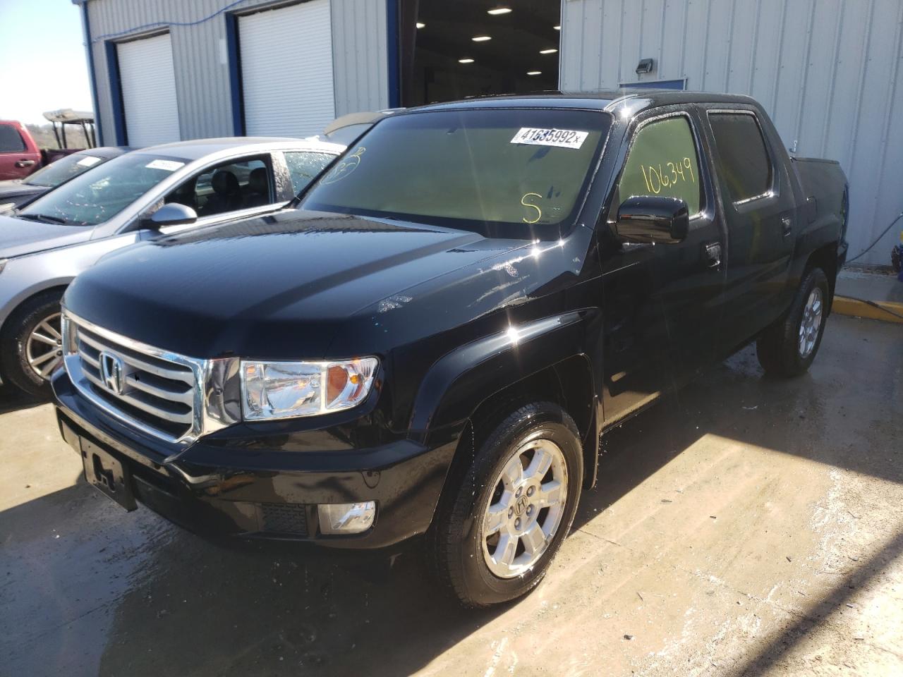 Photo 2 from auction – 2012 HONDA RIDGELINE with VIN 5FPYK1F42CB457855