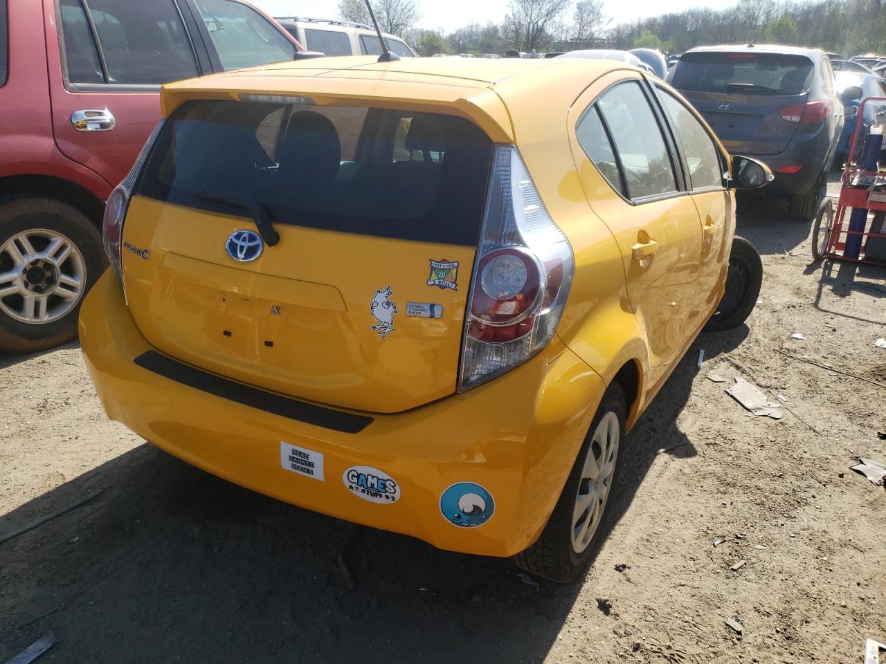 Photo 4 from auction – 2014 TOYOTA PRIUS C with VIN JTDKDTB39E1069972
