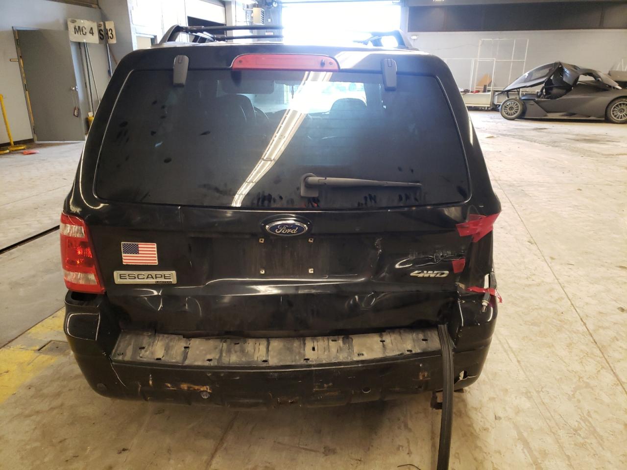 Photo 9 from auction – 2008 FORD ESCAPE LIM with VIN 1FMCU94128KB33055