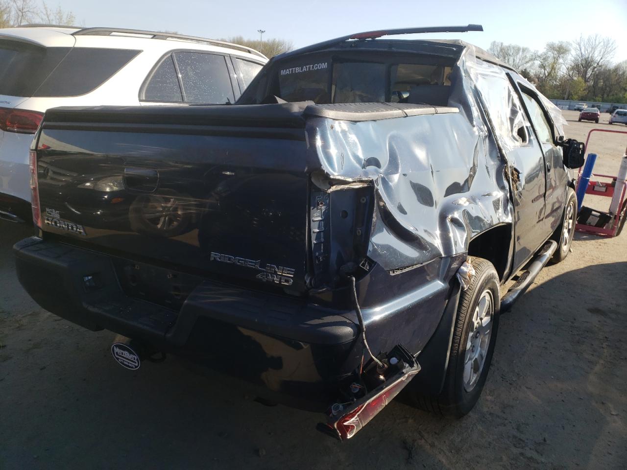 Photo 4 from auction – 2009 HONDA RIDGELINE with VIN 5FPYK16449B103845