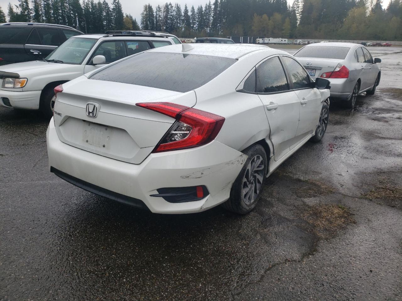 Photo 4 from auction – 2018 HONDA CIVIC EX with VIN 2HGFC2F83JH512697