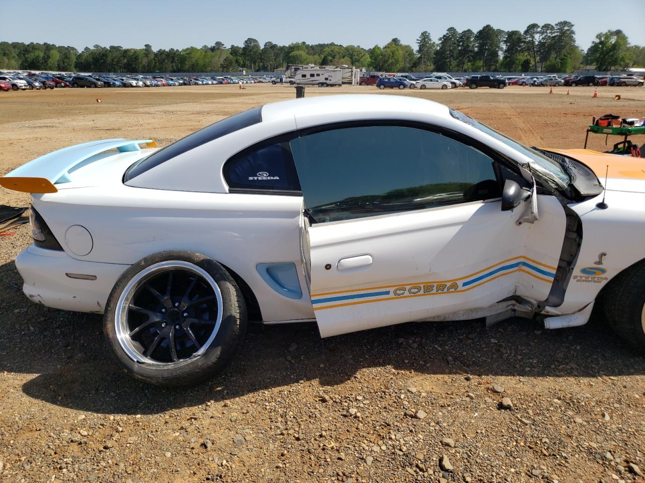 Photo 9 from auction – 1998 FORD MUSTANG CO with VIN 1FAFP47V5WF225265